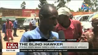 Blind Hawker: 27 year old Mwangi earns a living in Kiria-ini, Murang'a