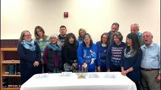 Lighting the 6th Night Hanukkah Candles with our Shir Hadash Board Members!