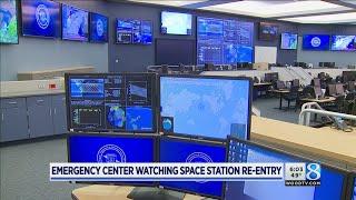 Emergency center watching space station re-entry