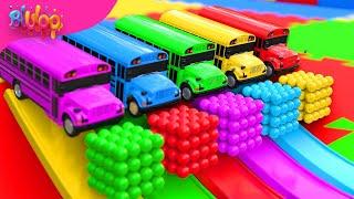 The Wheels on The Bus Song | Colorful Bus & SUPRISE EGGS | BluLoo Nursery Rhymes & Kids Songs