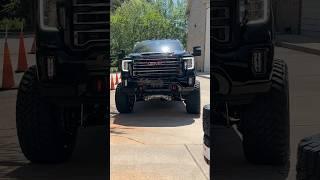 The GMC Sierra 2500 Denali with a McGaughys lift kit. #truck #liftedtrucks #lifted #at4 #sierraat4