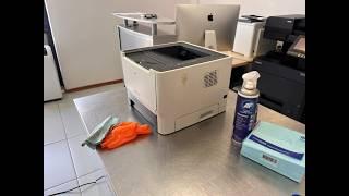 Cleaning plastics and removing stickers from printers and copiers