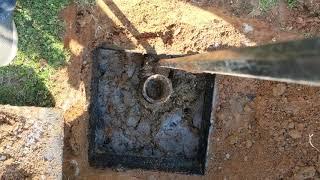 unclogging a clogged septic tank.