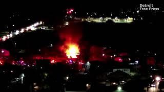 Fire from gas leak explosion in Orion Township captured in drone footage