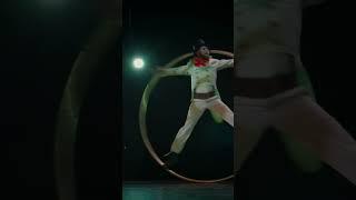 Spectacular Cross-Dressing Acrobat Inside A Giant Hoop