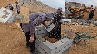 Qobad and Shokoofeh build animal shelters in the bitter cold of winter