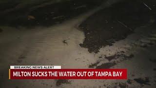 Hurricane Milton sucks water out of Tampa Bay