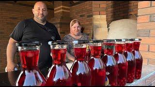 Husband and Wife Cook together We cook Compote from cherries For dinner, Lamb in a tandoor