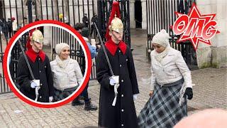 Women Takes Photo Gets A Surprise From Guard!