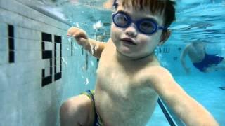 3yo William Swimming and Floating in the pool near the wall