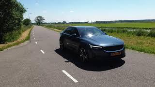 Driving my Polestar 2 on a sunny day through the polder in the Netherlands