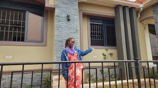 TOURING THE 4 BEDROOMS HOUSE IN AKRIGHT ESTATE BWEBAJJA KAMPALA UGANDA .