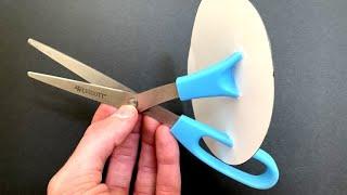 Cutting Scissors With Paper