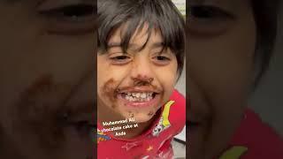 Muhammad Ali enjoying chocolate cake at Asda