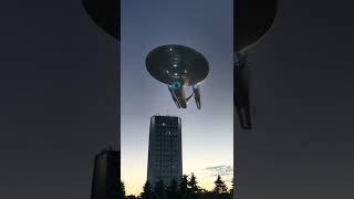 Star Trek starship over building