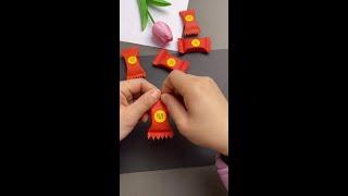 The New Year is coming. Make lovely candy red envelopes with your children. It is simple and beauti