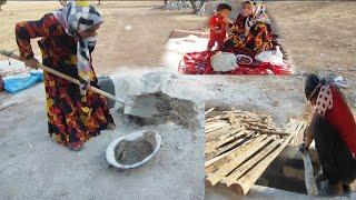 Zahra and Masoud's cooperation in roofing the hut