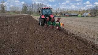 Плуг ПНО-3-40/55 навесной оборотный с регулируемой шириной захвата с трактором МТЗ-1523