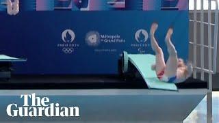 Diver slips during Olympic pool inauguration ceremony