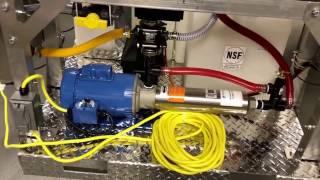 Booster pump skid with pro portioner and control wizard remote control system