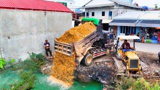 Amazing Landfill Delete Pond Flooded area !! Bulldozer Push stone , truck 5Ton Unloading stone