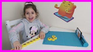 Valeria and Dad play with Playshifu Plugo Game System for Kids