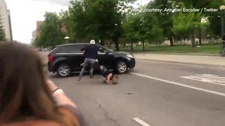 RAW: Graphic video shows protester run over in Denver