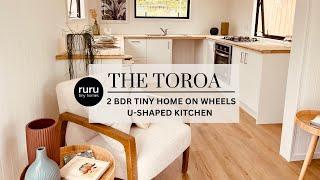 Ruru Tiny Homes: The Toroa - double storey two bedroom tiny home on wheels - U Shaped Kitchen music