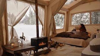 HOT TENT CAMP WITH STOVE IN HEAVY SNOW