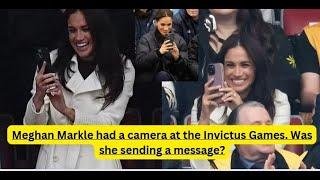 Meghan Markle had a camera at the Invictus Games. Was she sending a message?