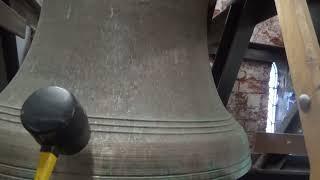 chiming the bells and hearing the distinct tones with a rubber mallet at st james barrow in Furness