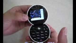 Football Shaped + Mobile Phones = Small Football Style Cell Phones .wmv