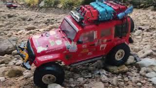 Rubicon Red carrying full load of goods through extreme ravine, rc car mudding crawler Adventure