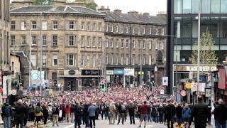 Football fans led by massed pipes & drums for 'Heart of Midlothian 150th Anniversary', Scotland