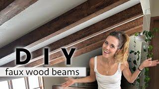 DIY Distressed Faux Beams Ceiling Transformation