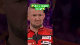 Aspinall is shocked. What is Pikachu doing?!Darts World Championship Dart WM Nathan