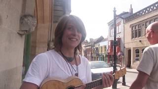 Avalon Pleiades performing in Glastonbury High Street