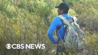CBS News joins volunteers searching for missing migrants on dangerous path