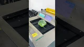 Automatic plastic wrap packaging machine, vegetable packaging machine, fruit packaging machine