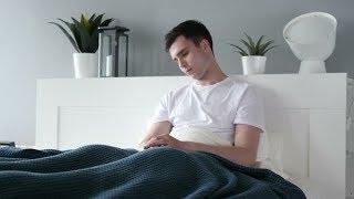 Man Sitting and Sleeping in Bed | Stock Footage - Videohive