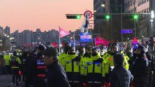 S.Korea: Police and protesters outside National Assembly | AFP