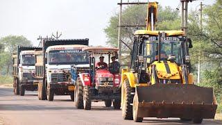 JCB 3dx Backhoe Machine Loading Red Mud in Mahindra Tractor and Tata 2518 Truck