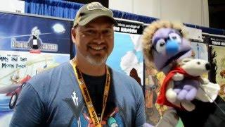 Flick, from The Nerd Soapbox, falls in love with Herobear at the 2015 Long Beach Comic Con.