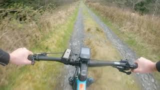 Cycling around the wind farm in Kiltimagh, Co. Mayo, Ireland. 4k 2160p