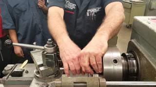 Instructor Kim Munson demonstrates setting up to cut threads on lathe Part1