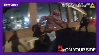 Raw video: body camera shows Ferguson police officer shoved during protest