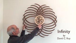 Winding the Infinity Kinetic Sculpture by David C. Roy