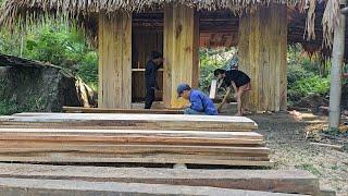 The homeless boy and the poor girl were helped by their uncle to make boards and walls for the house