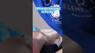 Effleurage massage to the leg