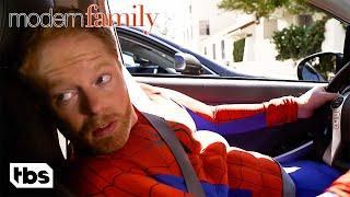 Mitchell Hides His Spider-Man Halloween Costume Under His Suit (Clip) | Modern Family | TBS